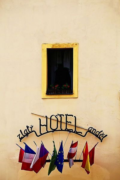 Susan Vizvary Photography 아티스트의 Hotel Window with Flags작품입니다.