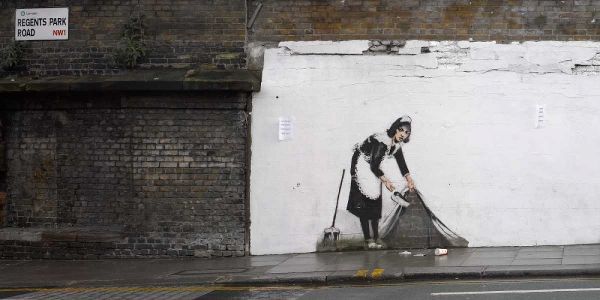 Regents Park Rd Camden London-graffiti attributed to Banksy