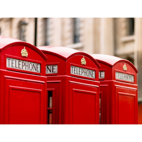 Close-up of telephone box in a row, England