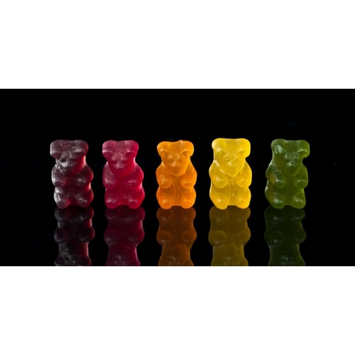 Gummy bears sweets in a row