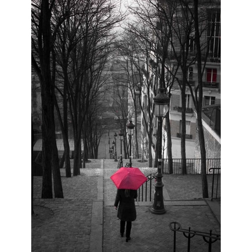 Woman with red umbrella standing on staircase in Montmartre, Paris, France