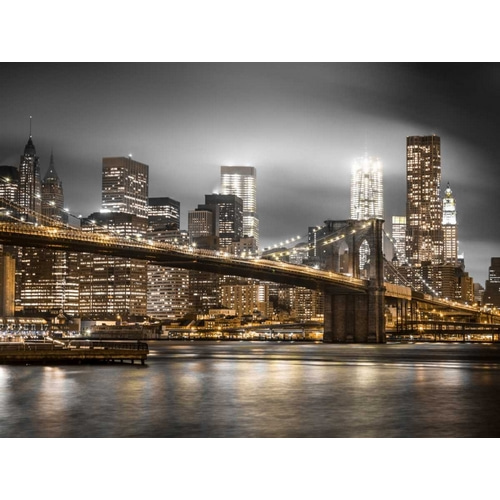 Evening shot of Brooklyn Bridge with Lower Manhattan skyline, New York