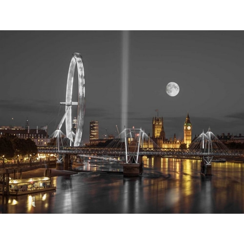 Night view of the London Eye, Golden Jubilee bridge and Westminster, London, UK