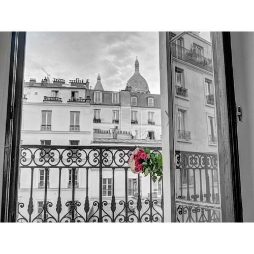 Bunch of flowers on balcony railing in an apartment of Montmartre, Paris, France