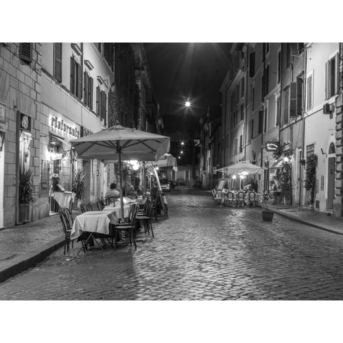 Sidewalk cafe on narrow streets of Rome, Italy
