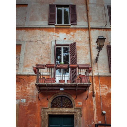 Old building with balcony in Rome, Italy