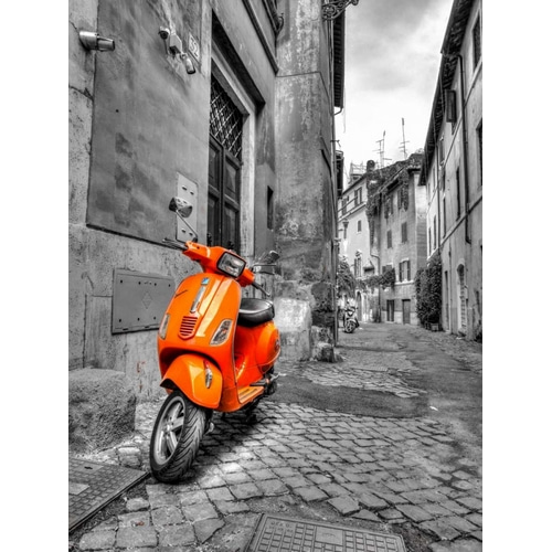 Scooter parked in narrow street of Rome, Italy