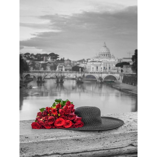 Hat and bunch of roses on bridge with Basilica di San Pietro in Vatican, Rome, Italy