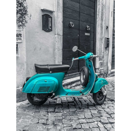 Old scooter on narrow street of Rome