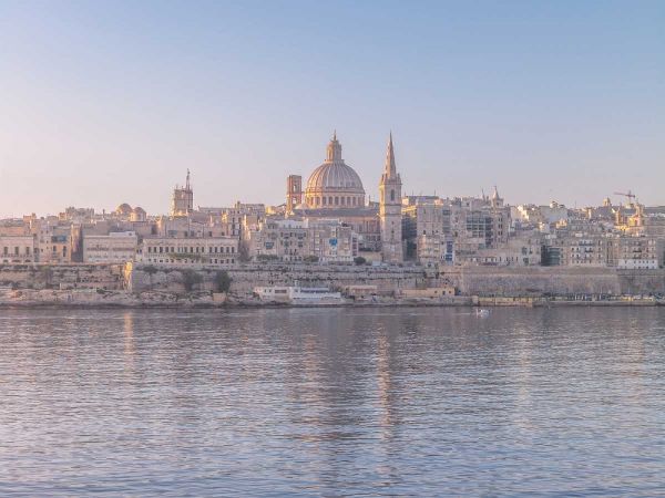 The harbour and St. Pauls Anglican Cathedral at Valletta, Malta