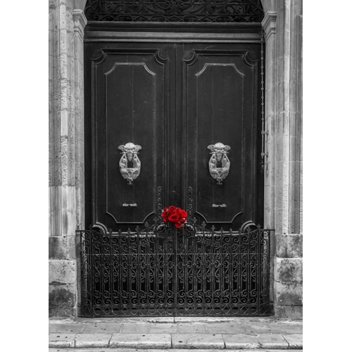 Bunch of roses on door of a house in Mdina, Malta