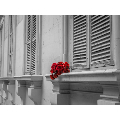 Bunch of roses on window of a house in Mdina, Malta