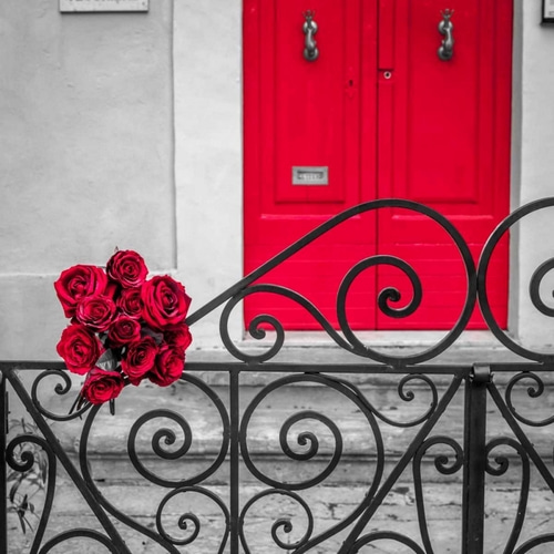 Bunch of roses on iron gate of an old house in Mdina, Malta