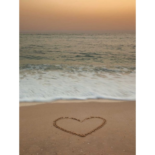 Sand writing - Heart shape drawn on beach