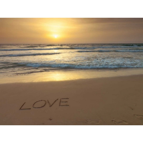 Sand writing - Word Love written on beach