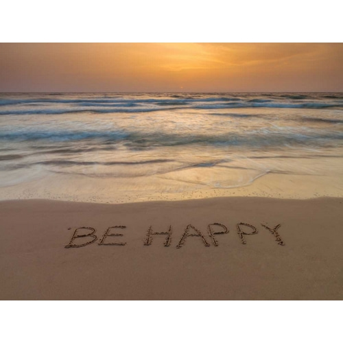 Sand writing - Word Be Happy written on beach