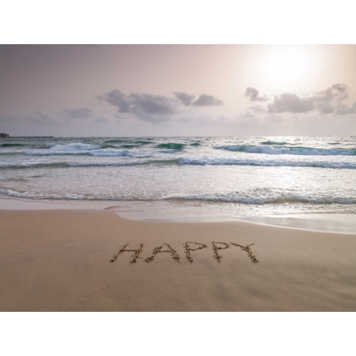 Sand writing - Word Happy written on beach