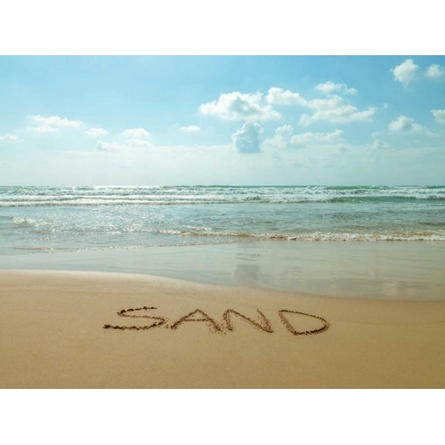Word Sand written on the beach