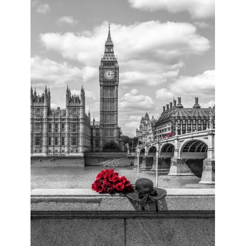 Bunch of Roses and hat on Thames promenade agaisnt Big Ben, London, UK