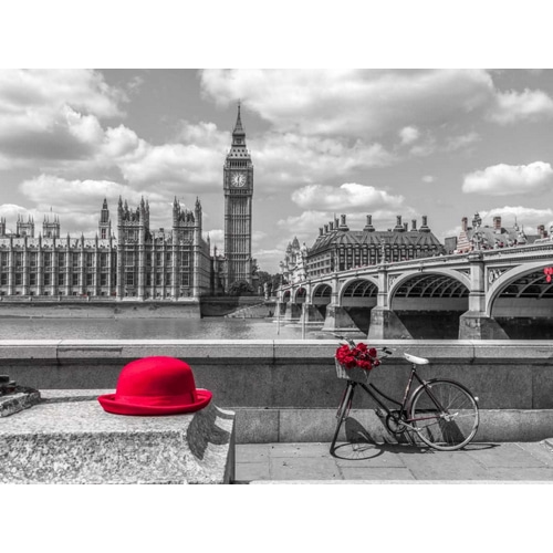 Red hat and bicycle on Thames promenade, London, UK