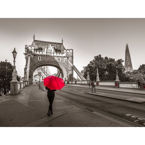 Tourist with umbrella on Tower Bridge, London, UK