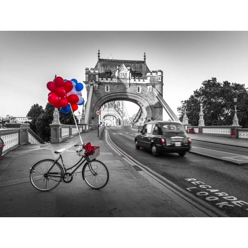Colorful balloons and bunch of roses on a bicycle at Tower bridge, London, UK