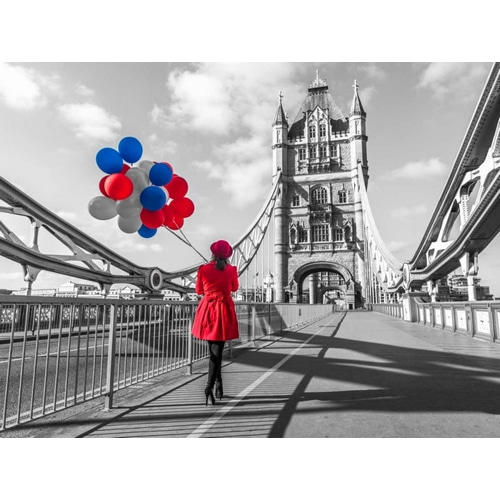 Tourist with colorful balloons on Tower Bridge, London, UK