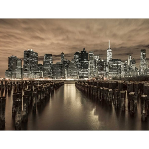 Manhattan skyline with rows of groynes in foreground, New York