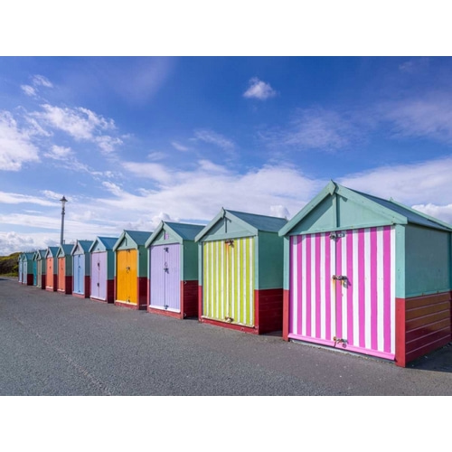 Colorful beach huts in a row