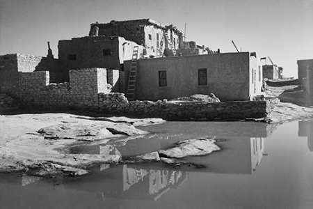 Adobe House with Water in Foreground - Acoma Pueblo, New Mexico - National Parks and Monuments, ca.