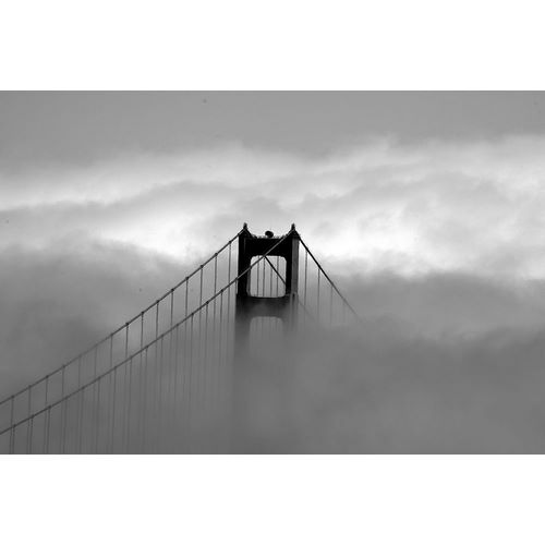 Golden Gate Bridge with fog rolling over it San Francisco California
