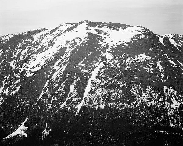 Full view of barren mountain side with snow, in Rocky Mountain National Park, Colorado, ca. 1941-194