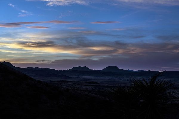 Sunset over the low mountains in the rugged terrain north of Big Bend National Park in the &quot;Trans-Pe