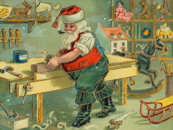 Santa Claus in workshop making toys
